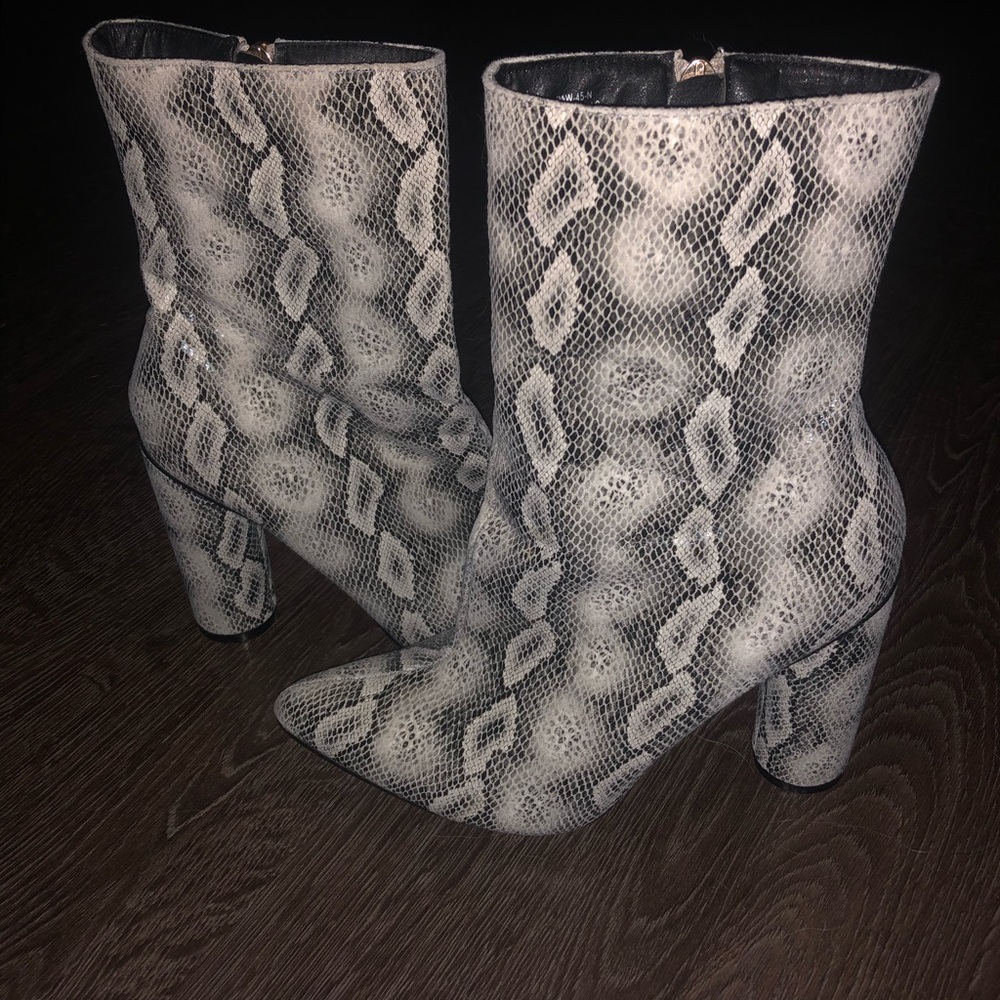 Snake skin heeled boots